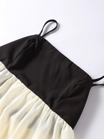 Schwarzes und weißes Patchwork-Langkleid